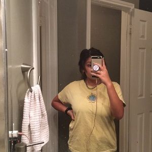 A darling pastel yellow Walk On shirt